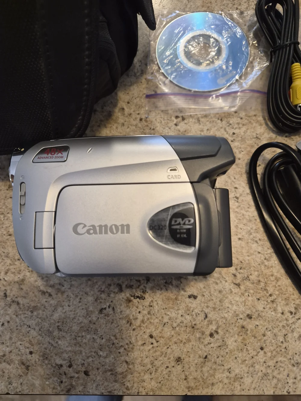 Canon Model # DC-320 Silver DVD Camcorder with Accessories